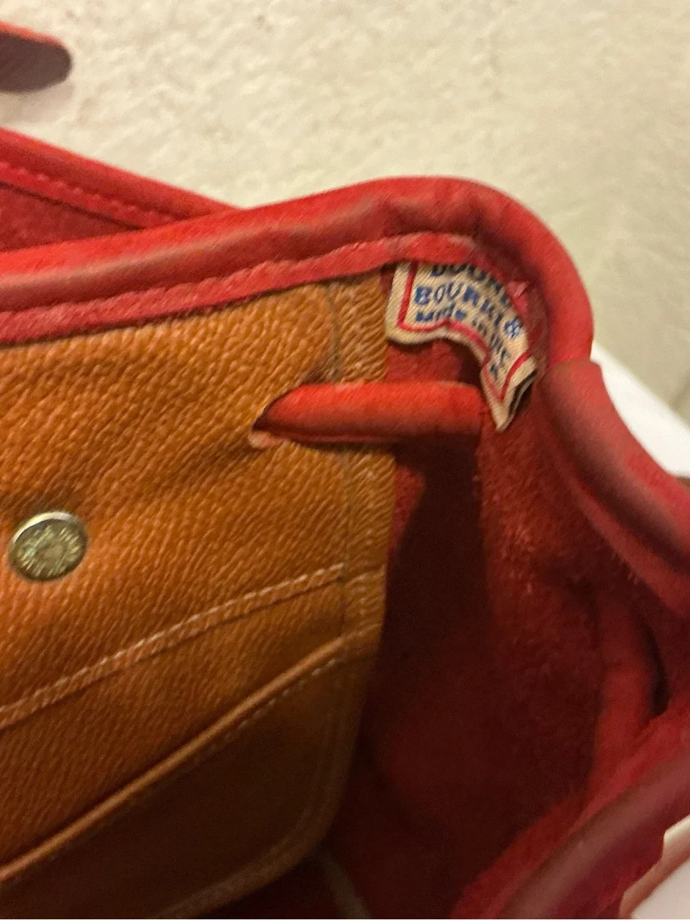 Dooney & Bourke Red Suede Drawstring Backpack with Tassel